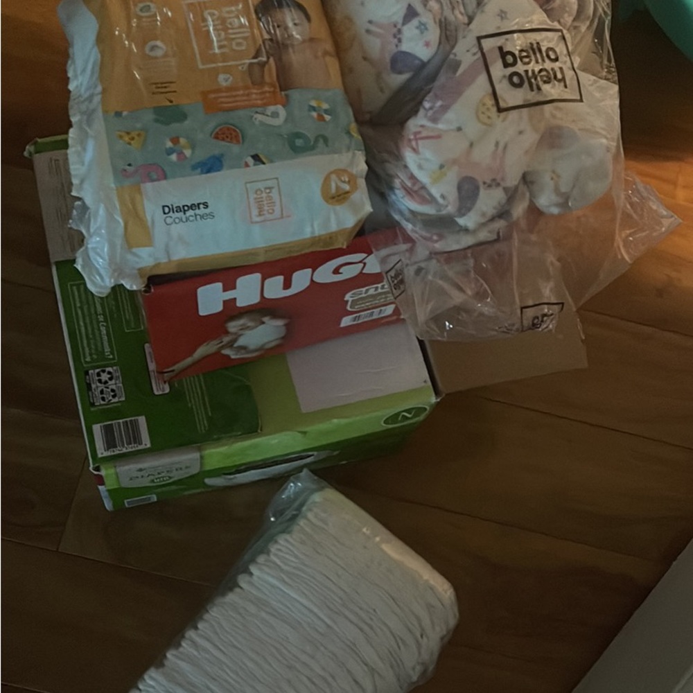 All Baby newborn things cases of diapers ,two bathtubs two swings Bluetooth cap